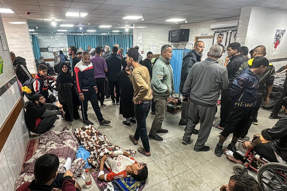 PHOTO: People walk and injured lie down on mats at the trauma ward in the Kamal Adwan Hospital in Beit Lahia the northern Gaza Strip on Oct. 24, 2024, amid the ongoing war in the Palestinian territory between Israel and Hamas.