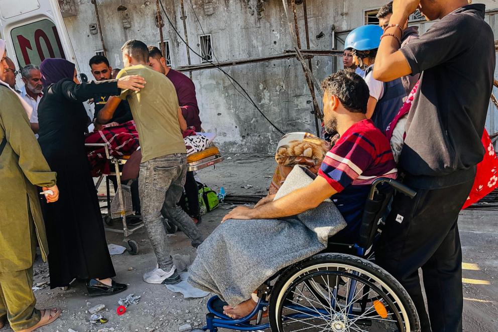 PHOTO: Medics evacuate injured people from the Kamal Adwan Hospital in Beit Lahia in the northern Gaza Strip on Oct. 28, 2024, to al-Shifa hospital in Gaza City in a joint World Health Organisation and Palestinian Red Crescent initiative. 