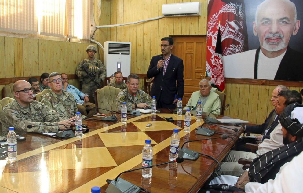 PHOTO: The head of NATO troops in Afghanistan, Gen. Scott Miller, center left, Kandahar Gov. Zalmay Wesa, center right, and their delegations attend a security conference, in Kandahar, Afghanistan, Oct. 18, 2018. 