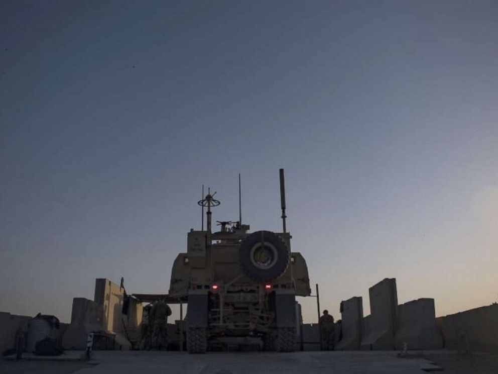 PHOTO: A security forces member from the 451st Expeditionary Support Squadron at Kandahar Airfield, Afghanistan, conducts perimeter sweeps of the base, Aug. 23, 2019.