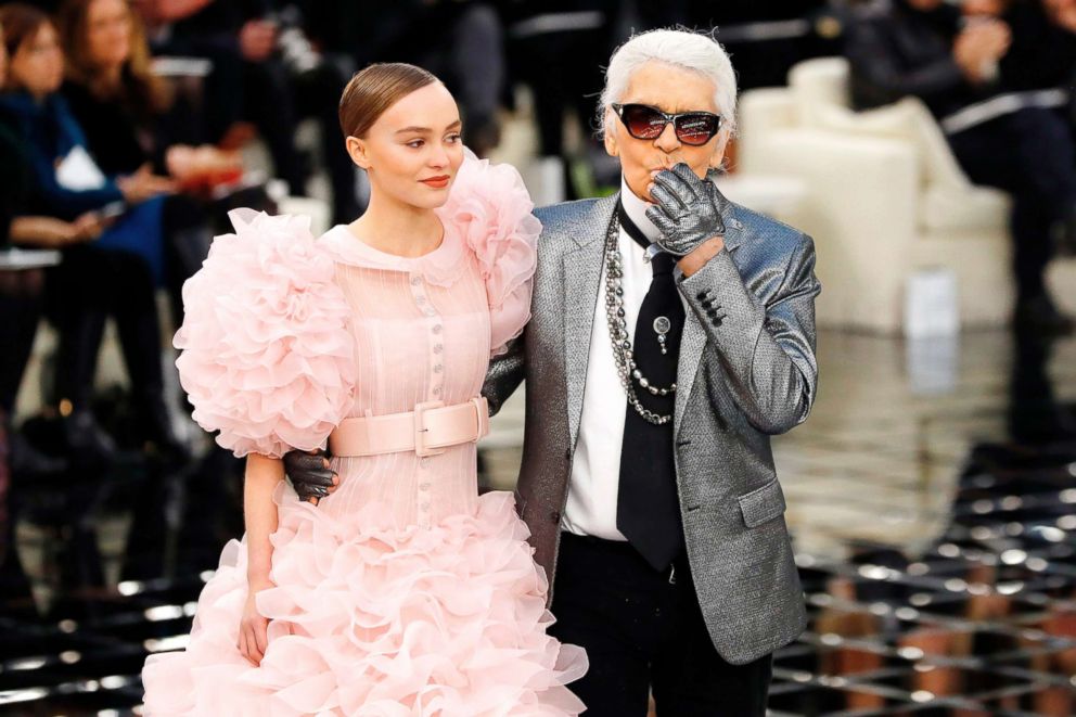 PHOTO: In this Jan. 24, 2017, file photo fashion designer Karl Lagerfeld acknowledges the audience next to Lily-Rose Melody Depp at the end of the Chanel during the 2017 spring/summer Haute Couture collection at the Grand Palais in Paris.