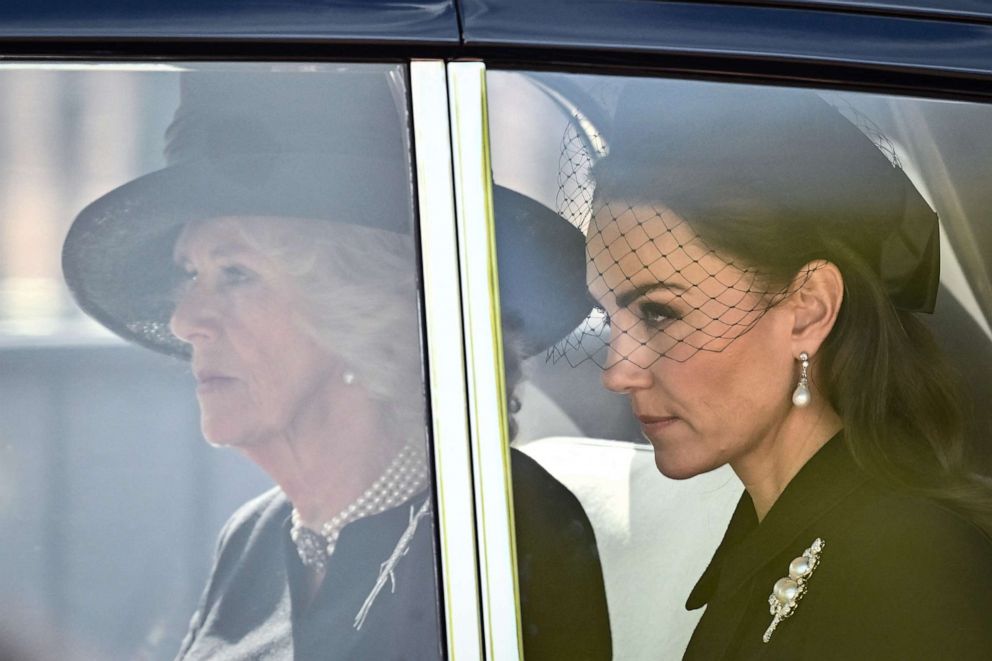 PHOTO: Britain's Camilla, Queen Consort and Britain's Catherine, Princess of Wales are driven behind the coffin of Queen Elizabeth II, during a procession from Buckingham Palace to the Palace of Westminster, in London, Sept. 14, 2022.