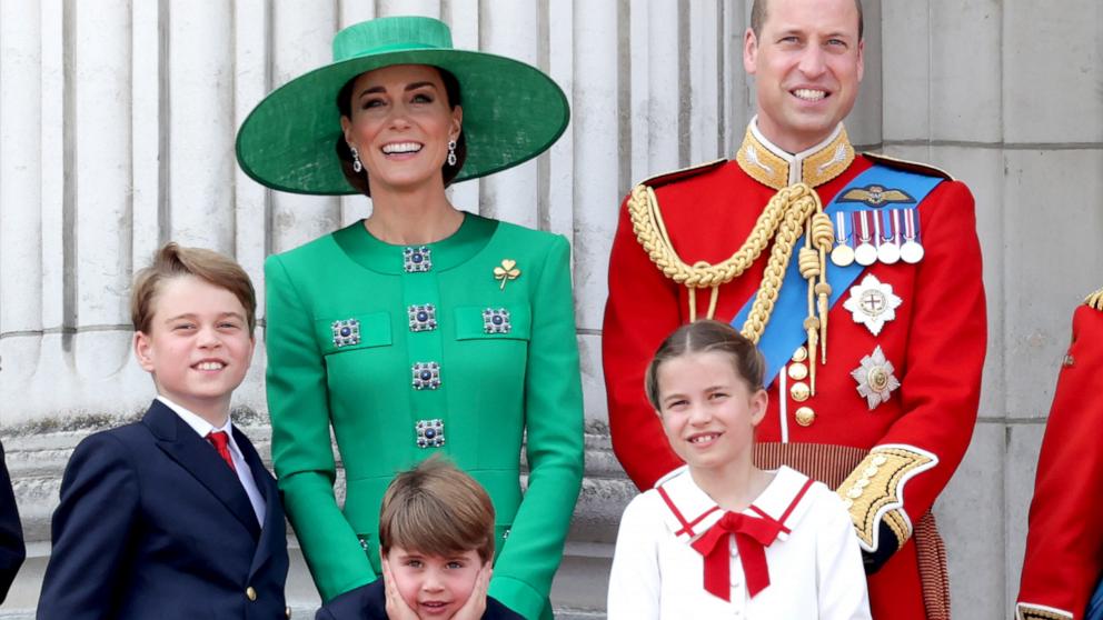 PHOTO: Prince William, Prince of Wales, Prince Louis of Wales, Catherine, Princess of Wales, Princess Charlotte, Prince Louis and Prince George of Wales on the Buckingham Palace balcony during Trooping the Colour, June 17, 2023, in London.