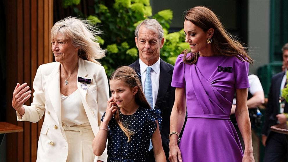 PHOTO: Britain's Catherine, Princess of Wales and Princess Charlotte on day fourteen of the 2024 Wimbledon Championships at the All-England Lawn Tennis and Croquet Club, London, July 14, 2024.