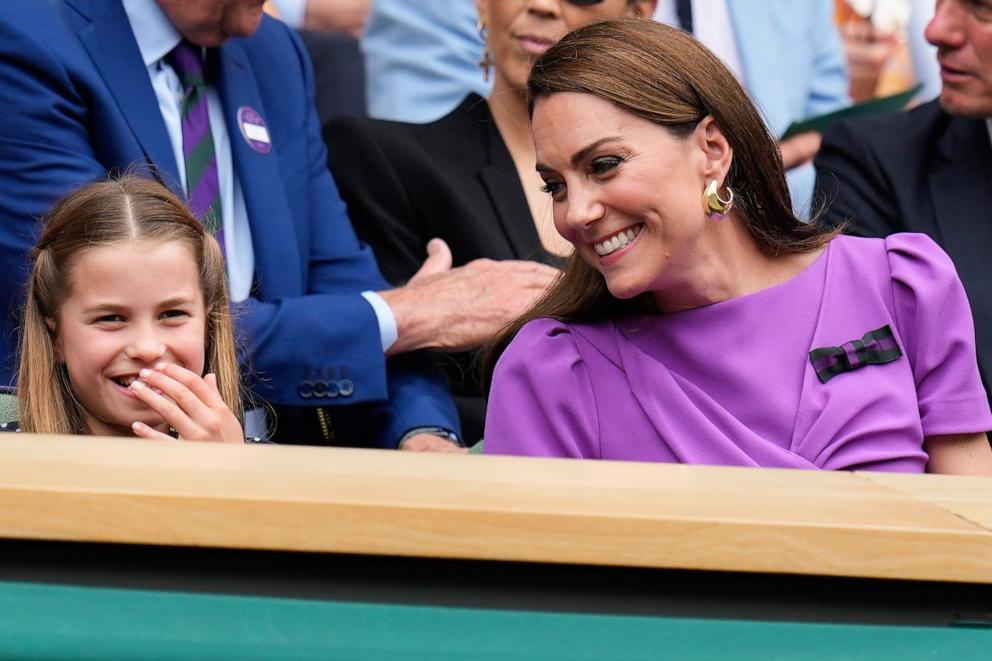 PHOTO: Kate, Princess of Wales and Princess Charlotte react on Centre Court ahead of the men's singles final at the Wimbledon tennis championships in London, July 14, 2024. 