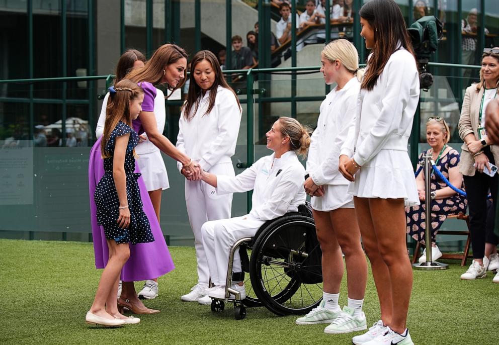 PHOTO: Catherine, Princess of Wales and Princess Charlotte meet Lucy Shuker during a visit to the All-England Lawn Tennis and Croquet Club in London, July 14, 2024.