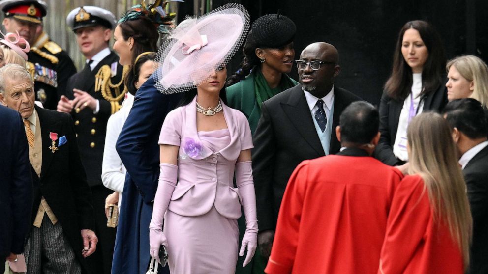 PHOTO: Katy Perry and Edward Enninful arrive at Westminster Abbey ahead of the Coronation of King Charles III and Queen Camilla, May 06, 2023 in London.