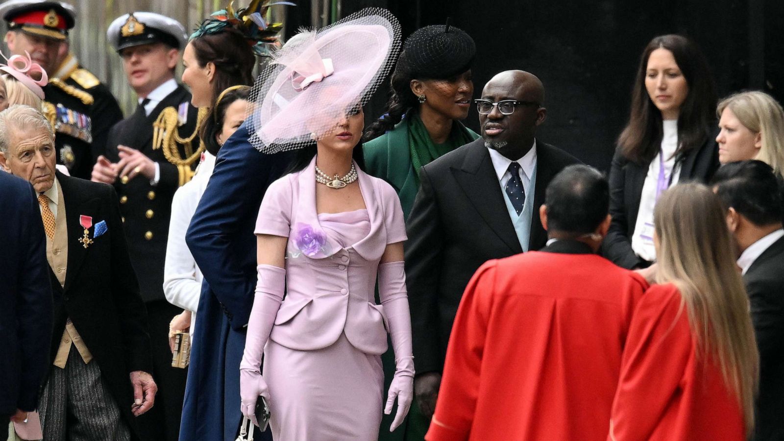 PHOTO: Katy Perry and Edward Enninful arrive at Westminster Abbey ahead of the Coronation of King Charles III and Queen Camilla, May 06, 2023 in London.