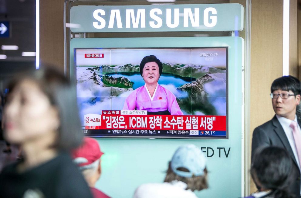 PHOTO: People watch a television screen showing an image of Ri Chun-hee, former news anchorwoman for North Korean broadcaster Korean Central Television (KCTV), during a news broadcast on North Korea's nuclear test at Seoul Station in Seoul, Sept. 3, 2017.