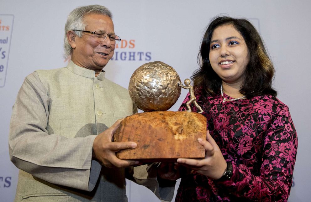 PHOTO: In this Dec. 2, 2016, file photo, Indian teen environmental activist Kehkashan Basu, 16, receives the International Children's Peace Prize 2016, from Nobel Peace Prize Winner Muhammad Yunus, at the Ridderzaal in The Hague, The Netherlands.