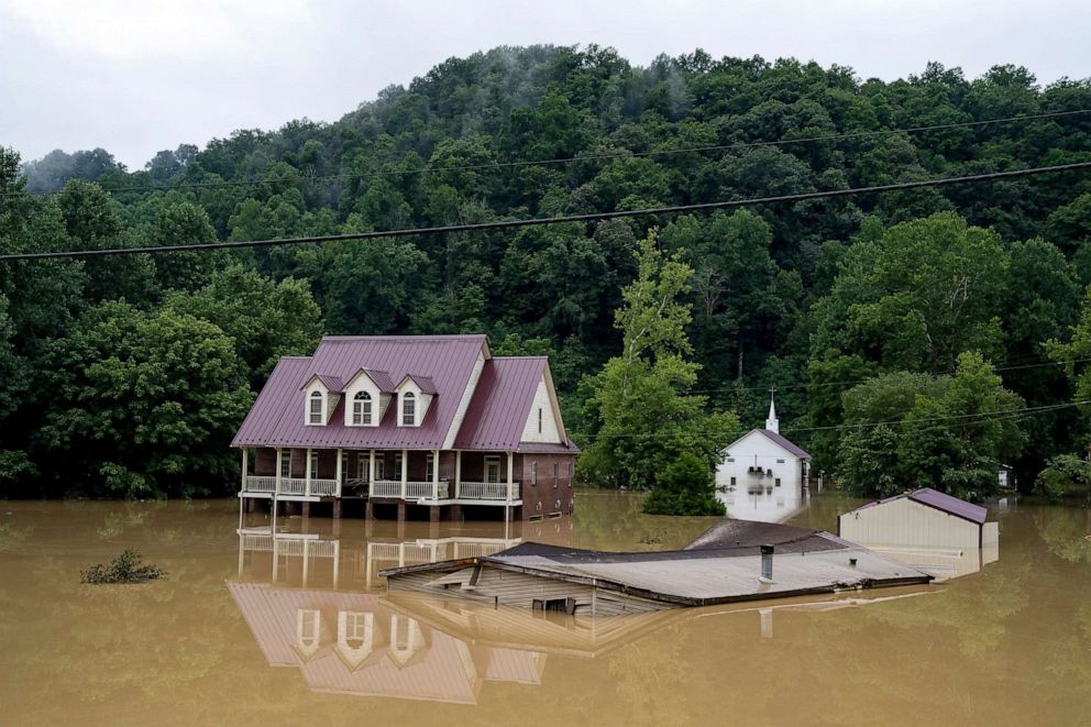 PHOTO: A house is almost completely submerged from recent flooding, July 29, 2022, in Breathitt County, Kentucky.