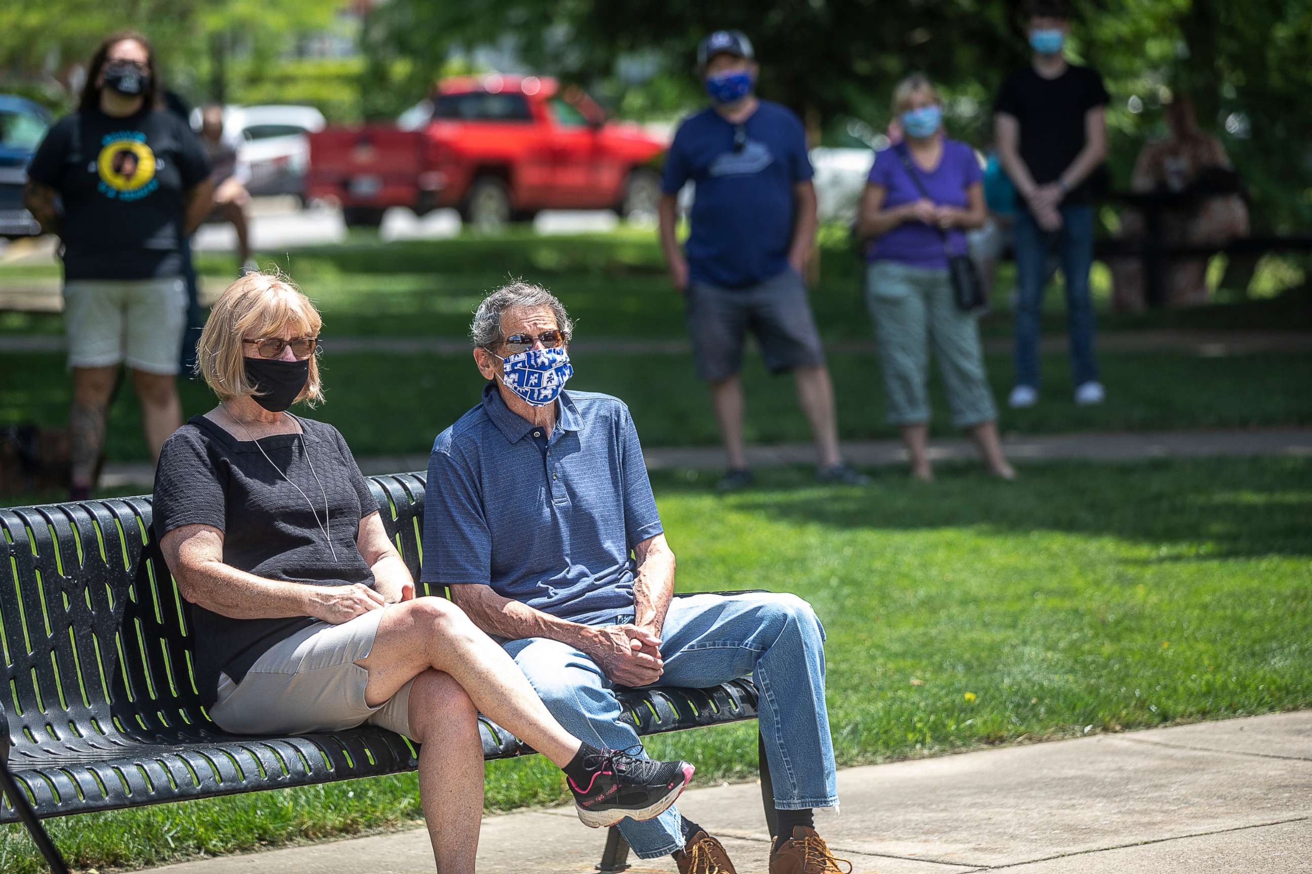 PHOTO: People listen as Senate candidate Charles Booker speaks at a campaign stop at Pikeville City Park in Pikeville, Ky., June 22, 2020.