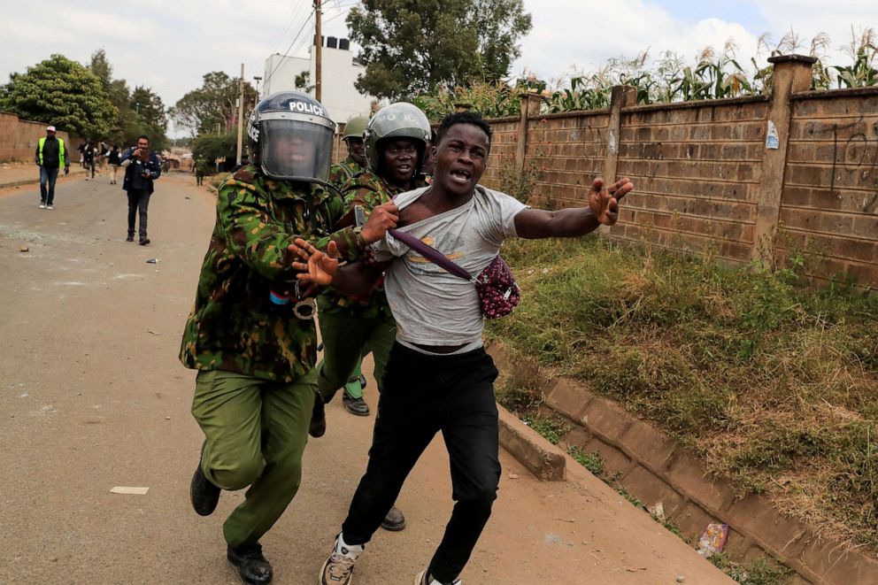 PHOTO: Riot police detain a supporter of Kenya's opposition leader Raila Odinga as he participates in an anti-government protest against the imposition of tax hikes by the government in Nairobi, Kenya, July 19, 2023.