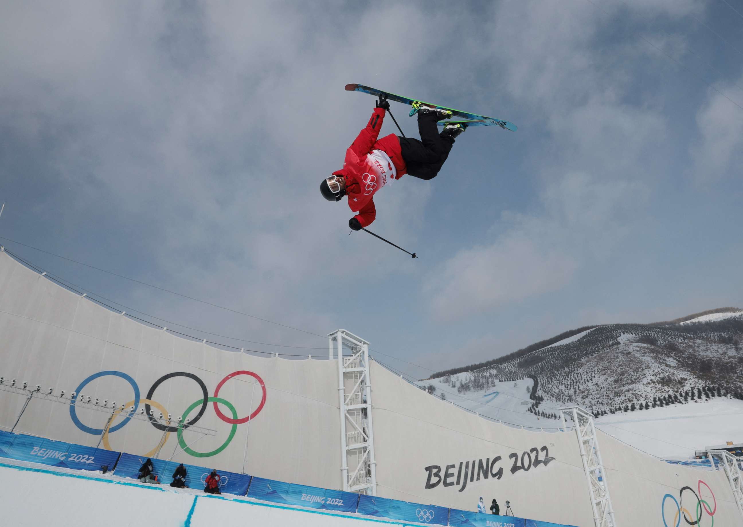 PHOTO: Kevin Rolland of Team France soars above the halfpipe in the men's freeski at the 2022 Beijing Olympics on Feb. 19, 2022