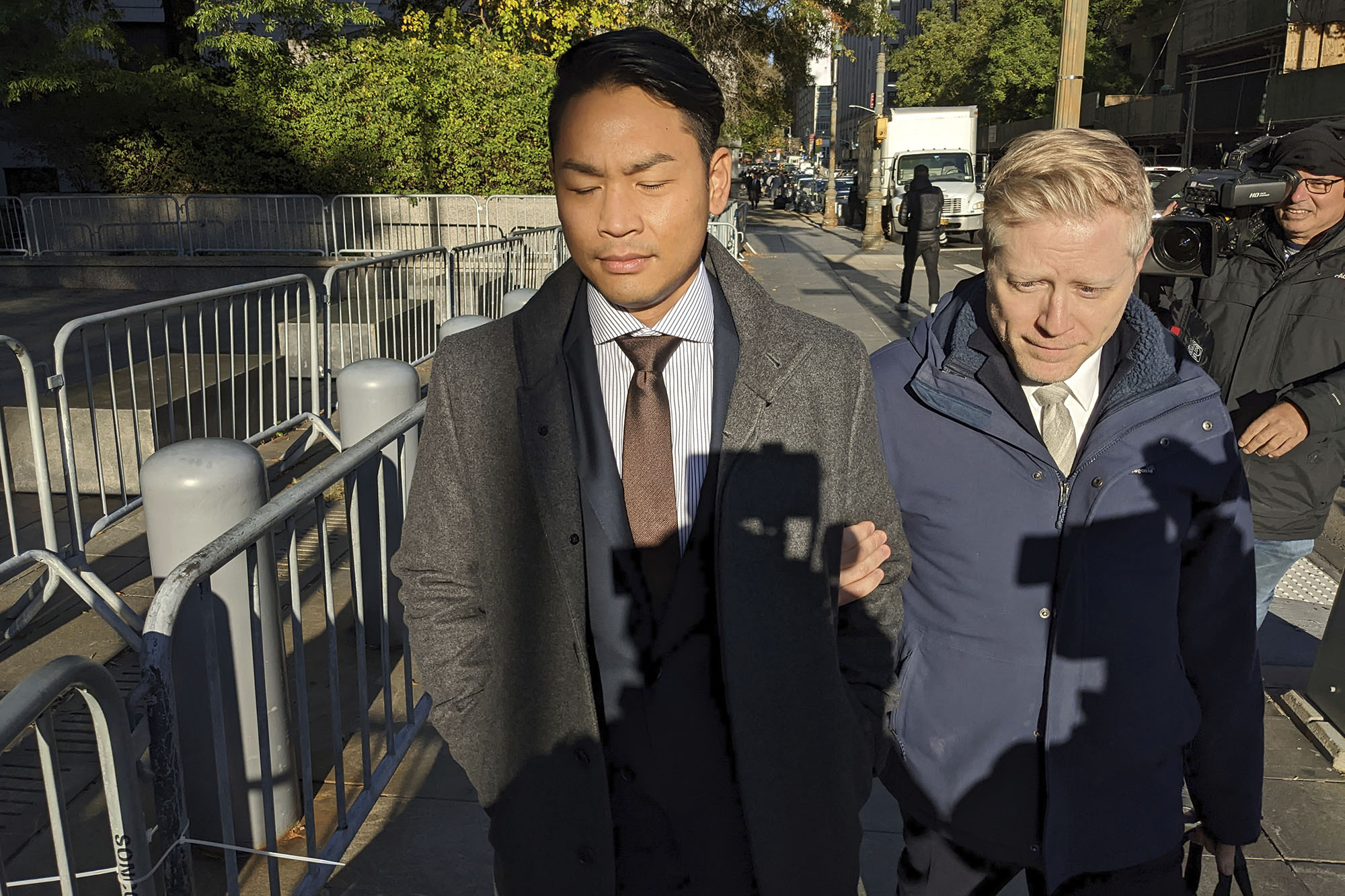 PHOTO: Anthony Rapp, right, and Ken Ithiphol arrive for a civil case against actor Kevin Spacey at a federal courthouse in lower Manhattan in New York, Oct. 20, 2022.