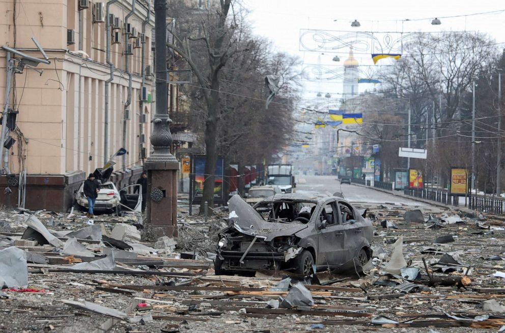 PHOTO: A vehicle sits in Kharkiv, near the regional administration building, which city officials said was hit by a missile attack, March 1, 2022.