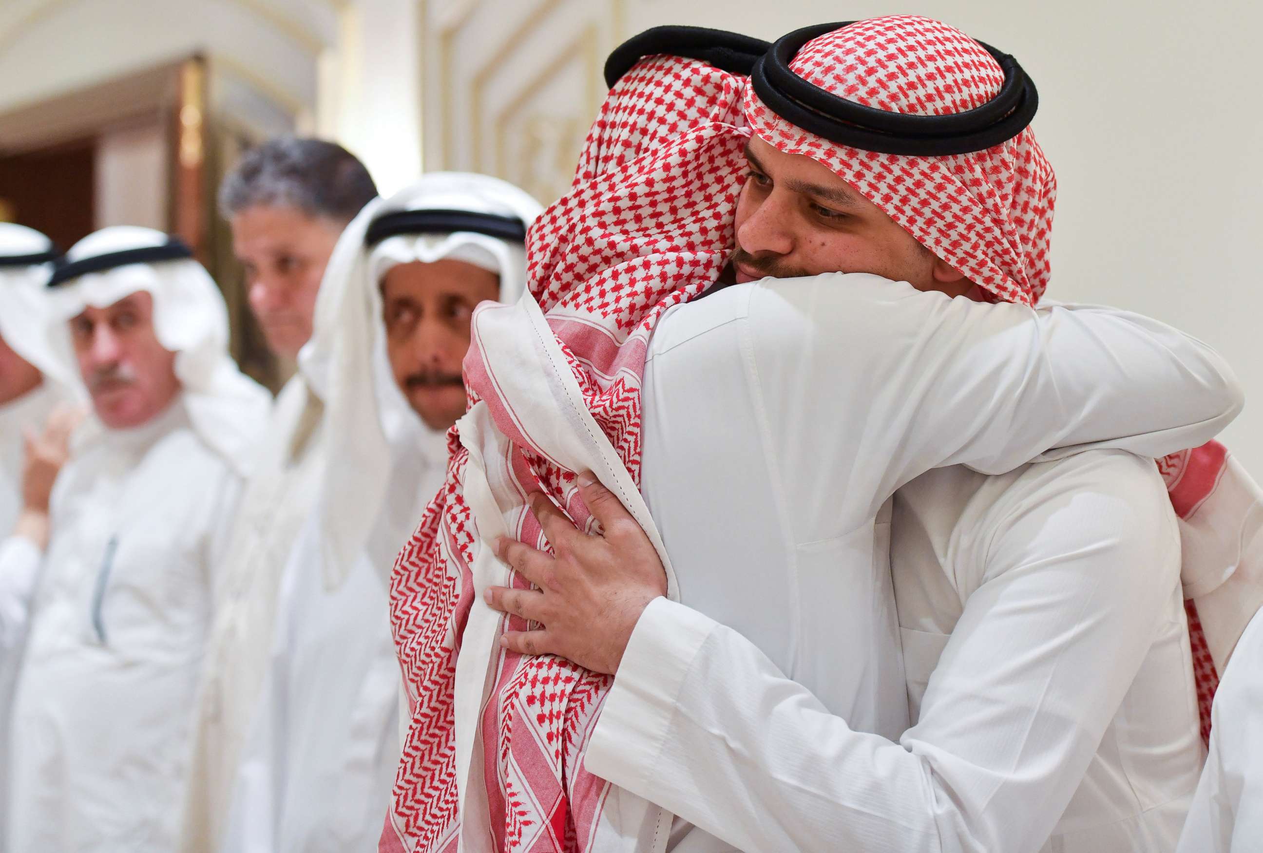 PHOTO: Salah Khashoggi, son of Saudi journalist Jamal Khashoggi, hugs a man offering condolences in Jeddah, Saudi Arabia, Nov. 16, 2018.