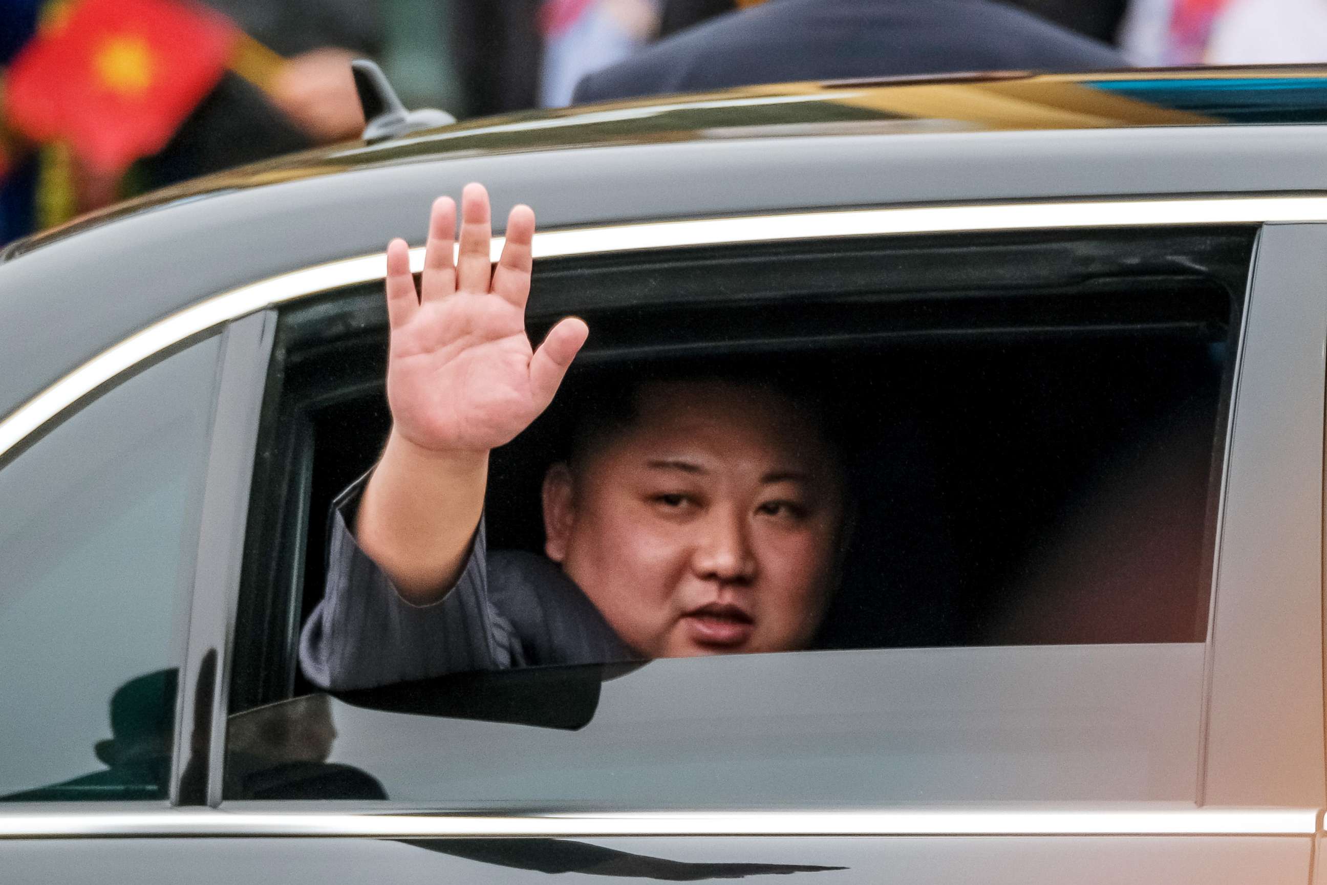 PHOTO: Kim Jong-Un waves from his car after arriving by train at Dong Dang railway station in Vietnam near the border with China, Feb. 26, 2019, ahead of the summit with President Donald Trump.