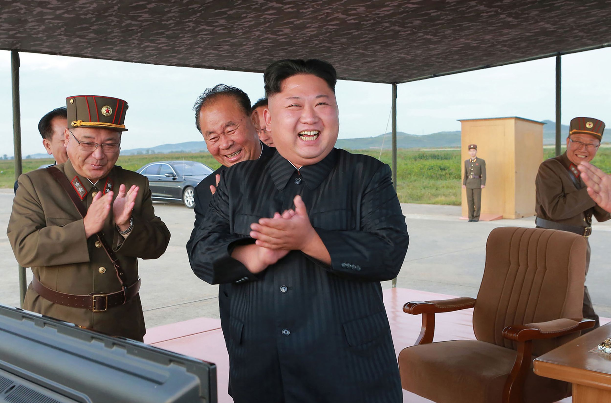 PHOTO: North Korean leader Kim Jong-Un (C) inspecting a launching drill of the medium-and-long range strategic ballistic rocket Hwasong-12 at an undisclosed location, Sept. 16, 2017.
