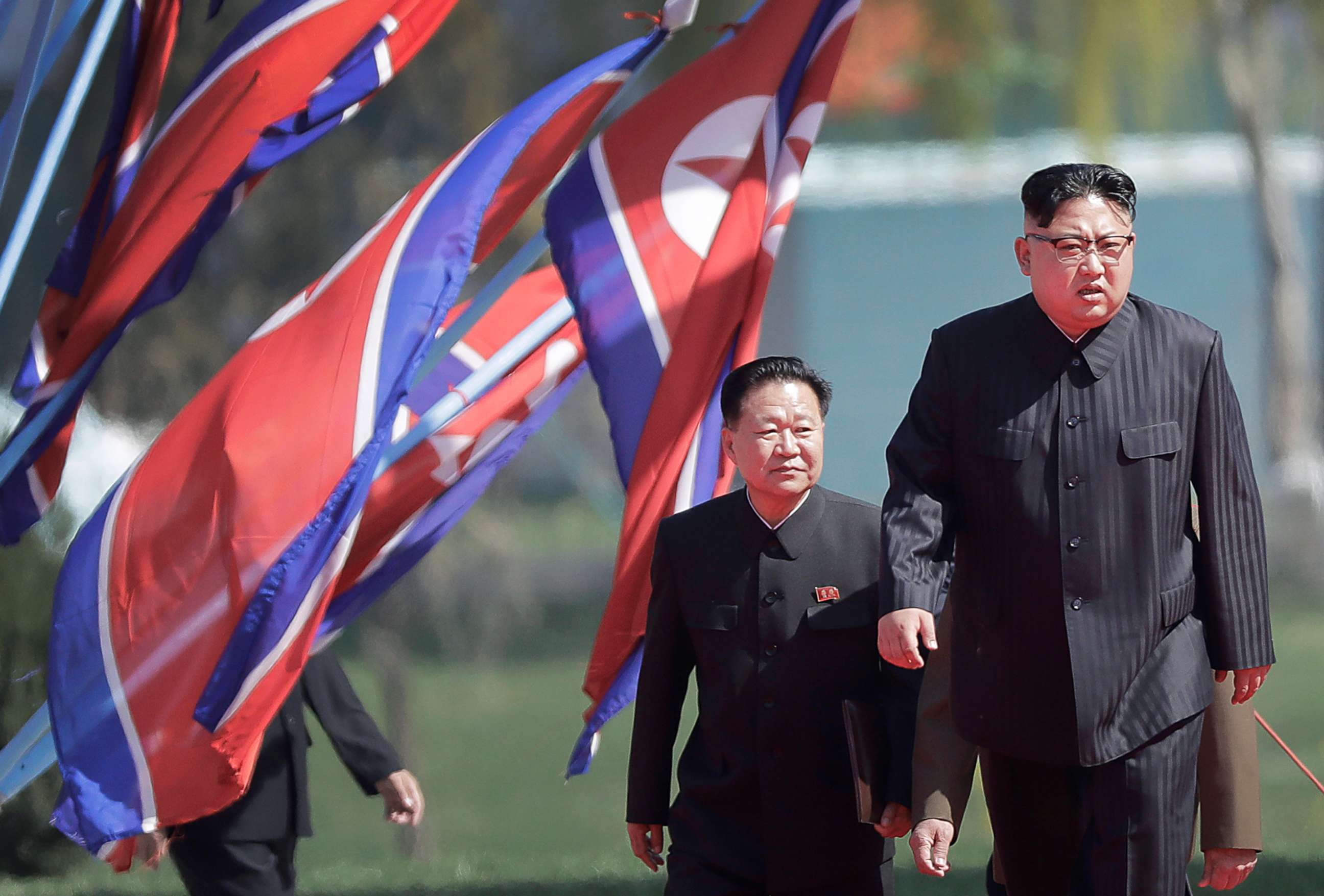 PHOTO: North Korean leader Kim Jong Un, right, and Choe Ryong Hae, vice-chairman of the central committee of the Workers' Party, arrive for the official opening of the Ryomyong residential area, April 13, 2017, in Pyongyang, North Korea. 