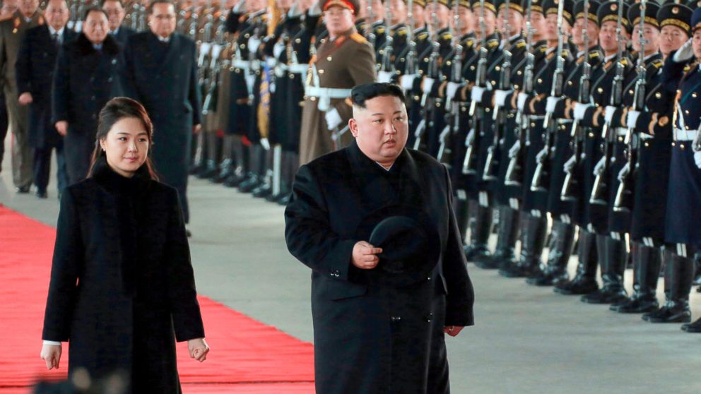 PHOTO: North Korean leader Kim Jong Un walks with his wife Ri Sol Ju at Pyongyang Station in Pyongyang, North Korea, before leaving for China, Jan. 7, 2019.