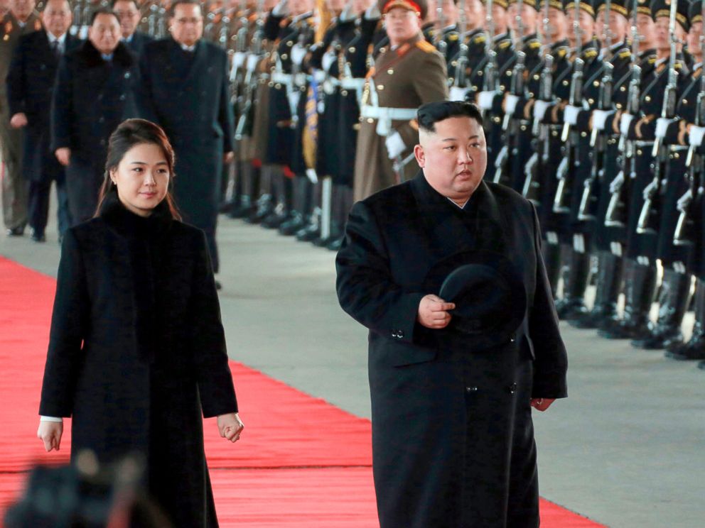 PHOTO: North Korean leader Kim Jong Un walks with his wife Ri Sol Ju at Pyongyang Station in Pyongyang, North Korea, before leaving for China, Jan. 7, 2019.
