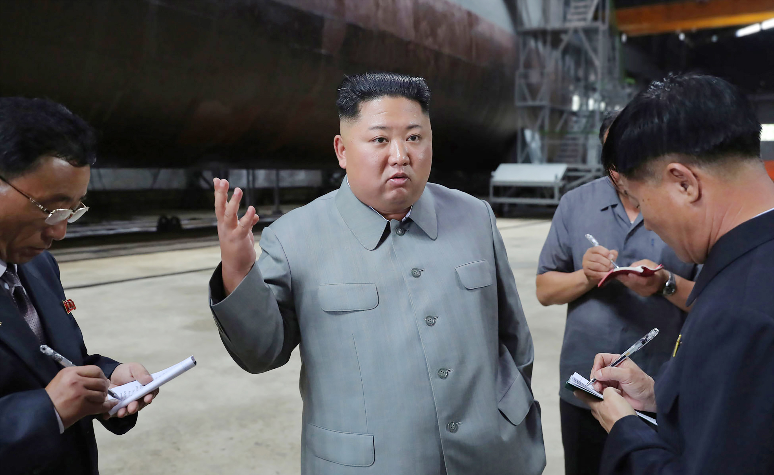 PHOTO: This undated picture released from North Korea's official Korean Central News Agency on July 23, 2019 shows North Korean leader Kim Jong Un inspecting a newly built submarine at an undisclosed location.