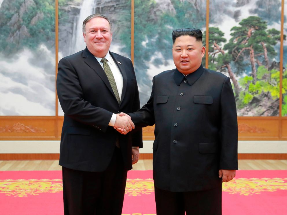 PHOTO: In this photo provided by the North Korean government, Secretary of State Mike Pompeo, left, shakes hands with North Korean leader Kim Jong Un as they pose for a photo in Pyongyang, North Korea, Oct. 7, 2018.