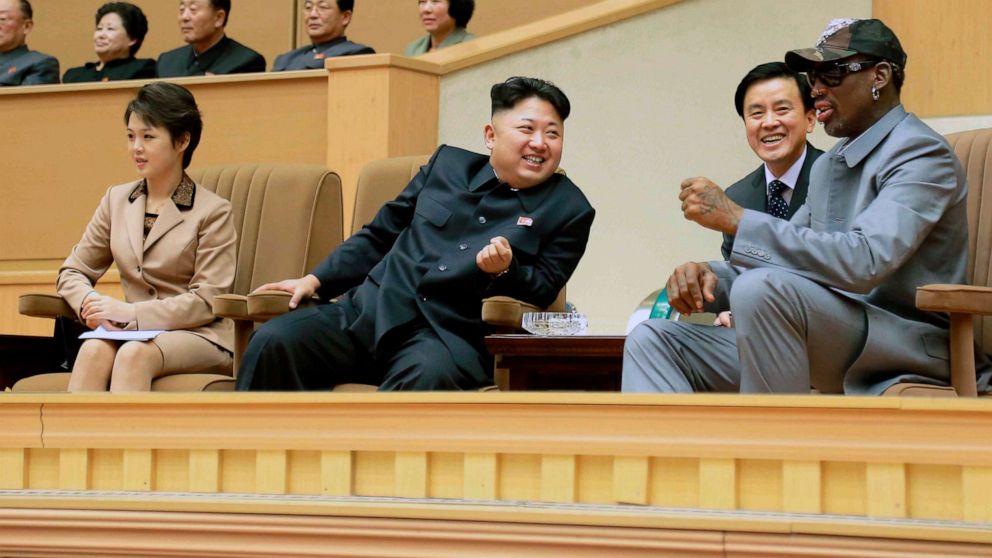 North Korean leader Kim Jong Un watches a basketball game between former NBA basketball players and North Korean players of the Hwaebul team of the DPRK with Dennis Rodman, right, at Pyongyang Indoor Stadium in this undated photo released by KCNA in Pyongyang Jan. 9, 2014.