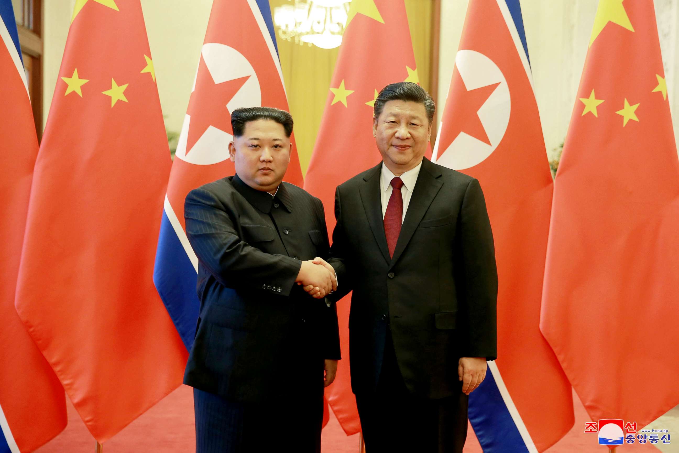 PHOTO: North Korean leader Kim Jong Un shakes hands with Chinese President Xi Jinping in Beijing as he paid an unofficial visit to China, in this undated photo released by North Korea's Korean Central News Agency in Pyongyang March 28, 2018.