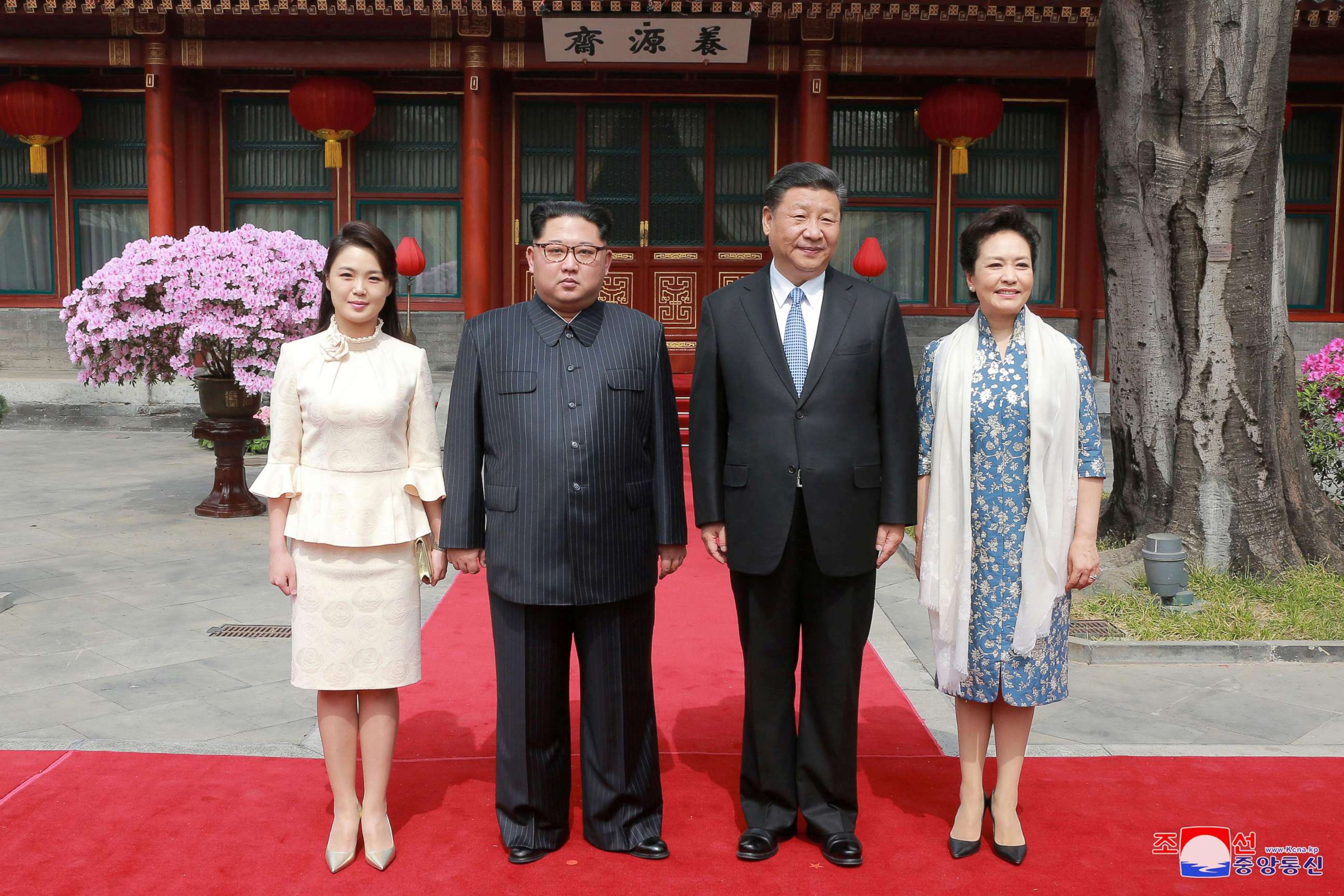 PHOTO: North Korean leader Kim Jong Un and wife Ri Sol Ju, and Chinese President Xi Jinping and wife Peng Liyuan pose for a photo in Beijing, China in this undated photo released by North Korea's Korean Central News Agency in Pyongyang March 28, 2018