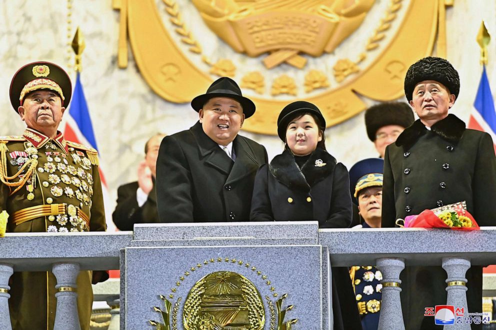 PHOTO: In this photo provided by the North Korean government, North Korean leader Kim Jong Un, center left, with his daughter, reportedly named Kim Ju Ae, attends a military parade on Kim Il Sung Square in Pyongyang, North Korea on Feb. 8, 2023.