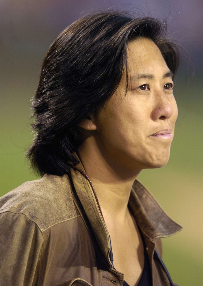 PHOTO: Los Angeles Dodgers vice president and assistant general manager Kim Ng watches batting practice before game against the Angels at Angel Stadium in Anaheim, Calif. on April 1, 2005.