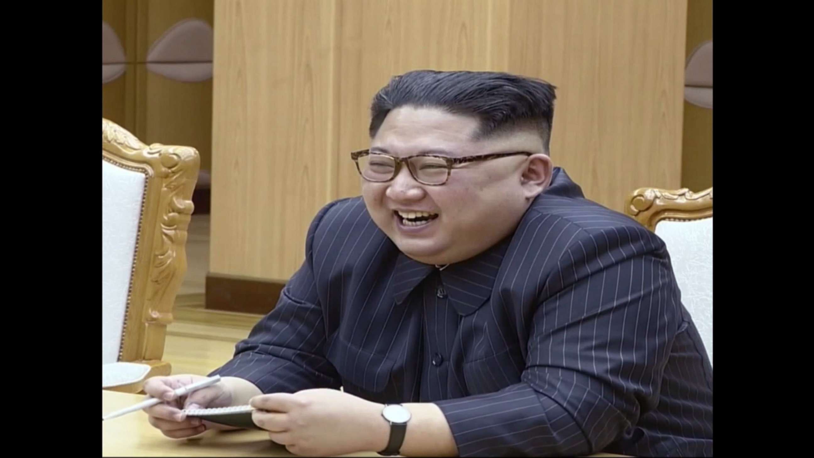 PHOTO: A scene shown on North Korean state TV of North Korean President Kim Jong Un laughing during a meeting with U.S. Secretary of State Mike Pompeo, May 9, 2018. 
