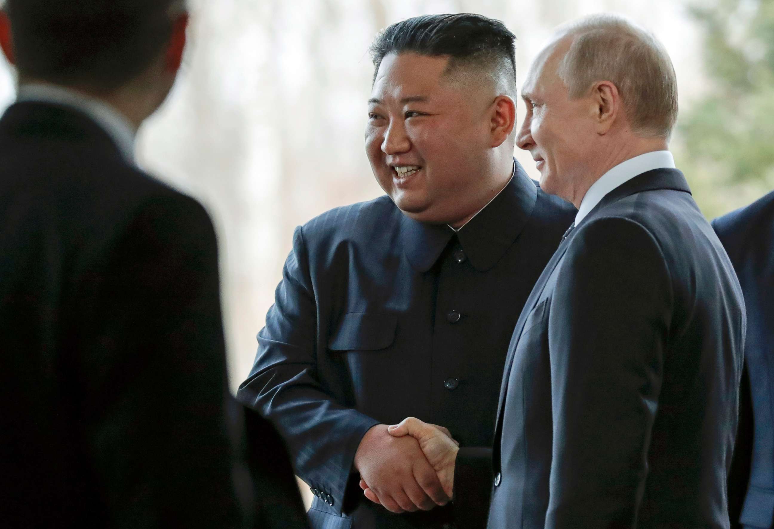 PHOTO: Russian President Vladimir Putin, right, and North Korea's leader Kim Jong Un shake hands during their meeting in Vladivostok, Russia, April 25, 2019.