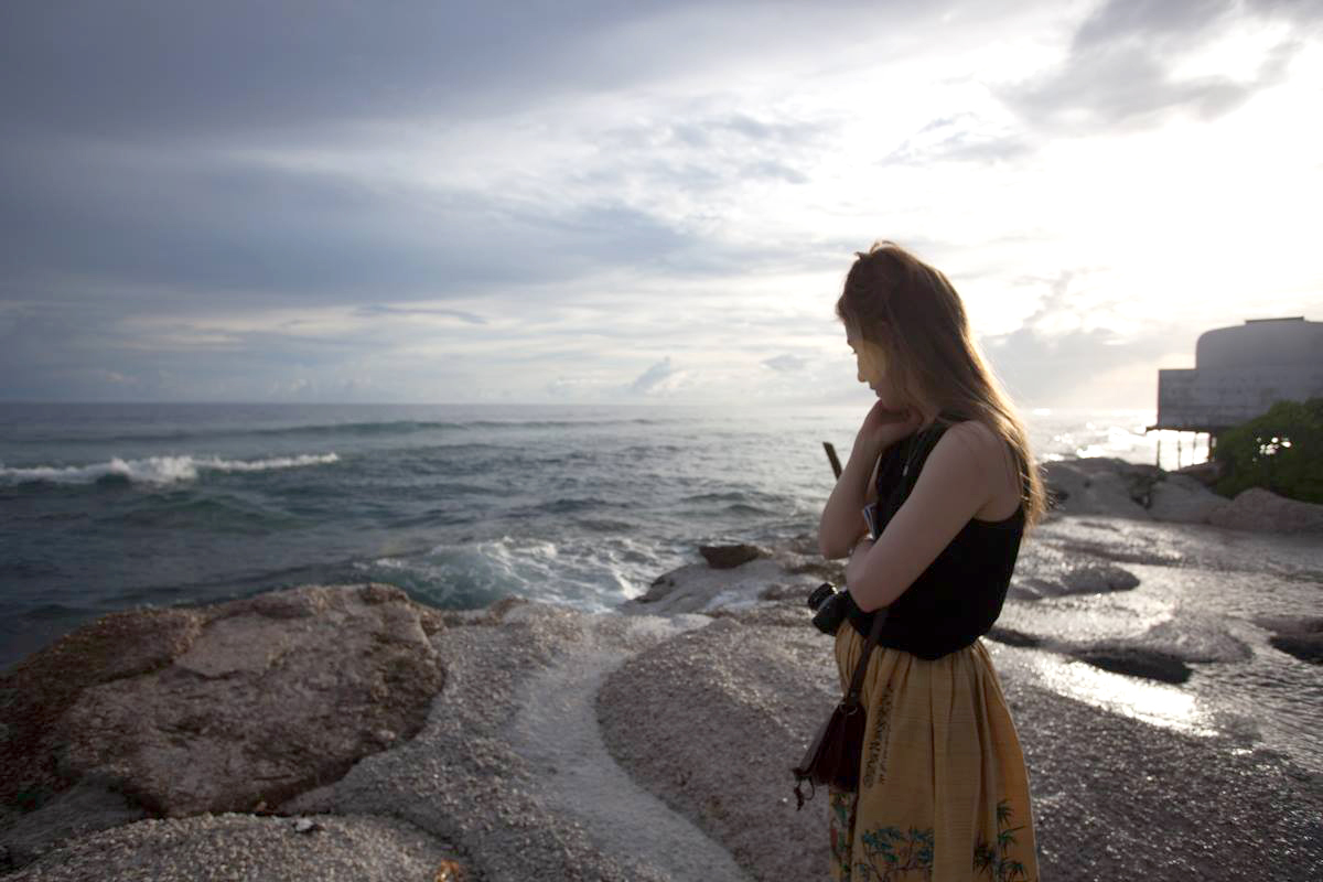 PHOTO: Kim Wall stands on a road of Majuro, a low-lying atoll and capital of the Marshall Islands, in 2015.