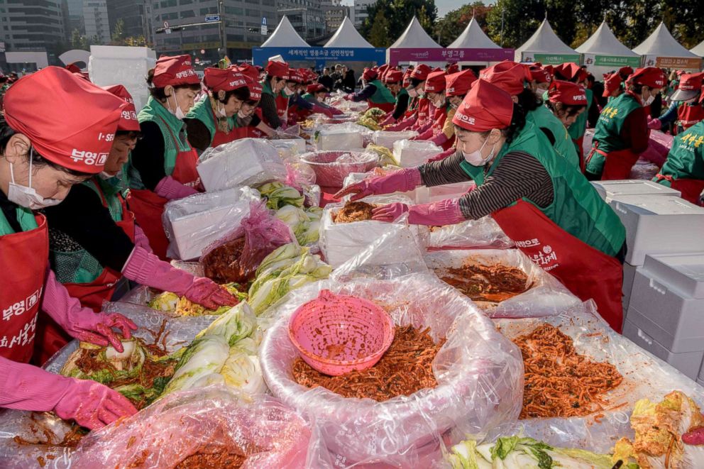 PHOTO: Volunteers take part in a kimchi making festival in Seoul, Nov. 2, 2018.