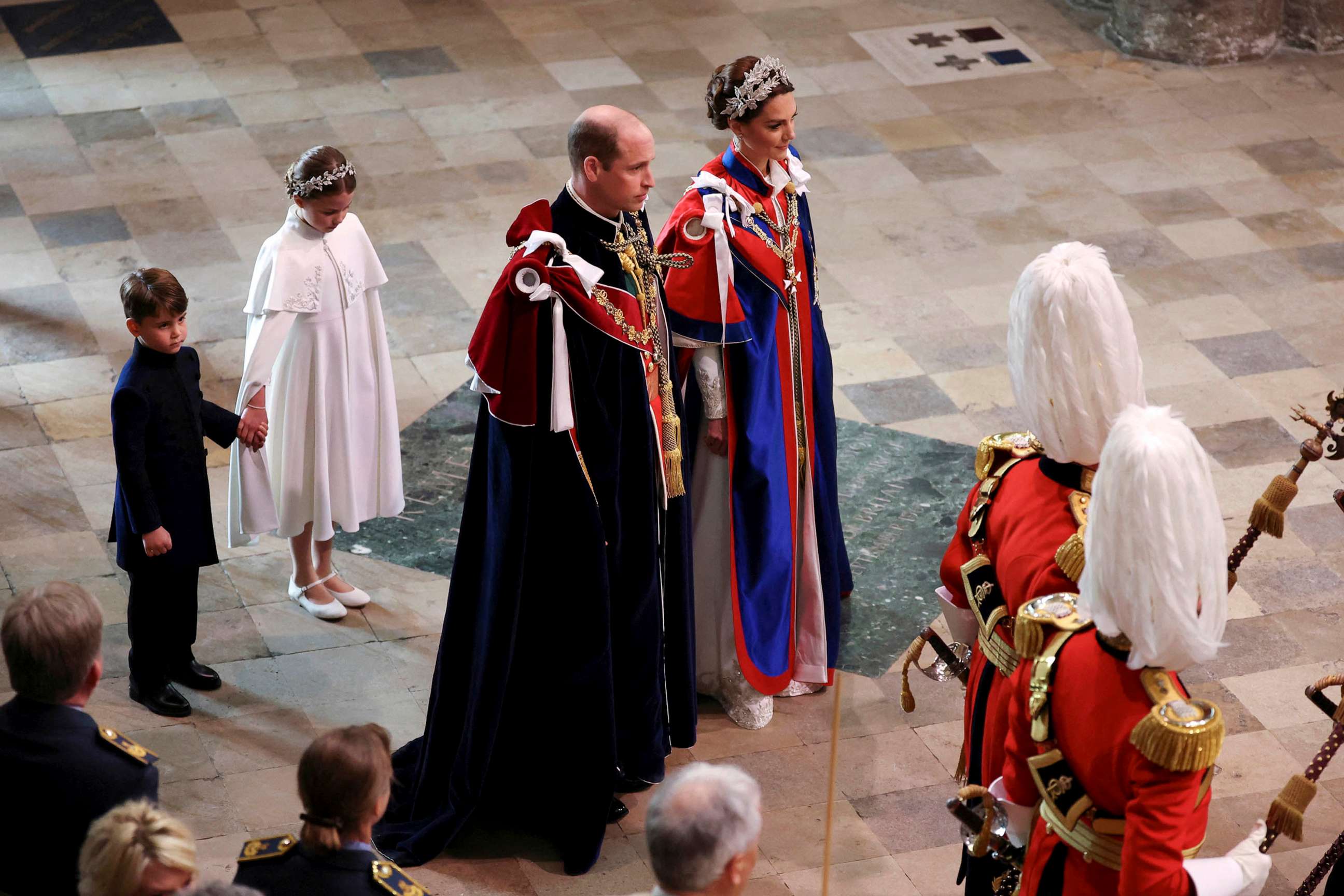 PHOTO: Britain's Prince William and Kate, Princess of Wales, followed by Princess Charlotte and Prince Louis, arrive for the coronation of King Charles III at Westminster Abbey, London, May 6, 2023.