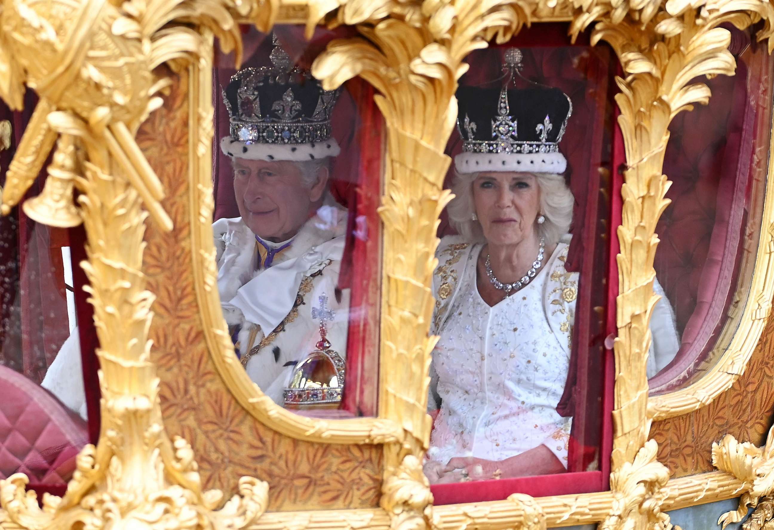 PHOTO: King Charles III and Queen Camilla travelling in the Gold State Coach built in 1760 and used at every Coronation since that of William IV in 1831sets off from Westminster Abbey on route to Buckingham