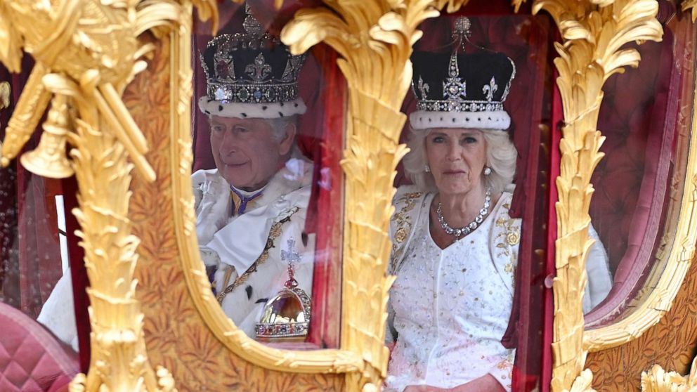 PHOTO: King Charles III and Queen Camilla travelling in the Gold State Coach built in 1760 and used at every Coronation since that of William IV in 1831sets off from Westminster Abbey on route to Buckingham