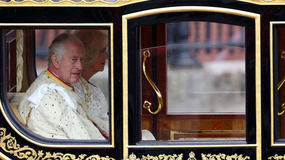 PHOTO: Britain's King Charles and Queen Camilla sit in Diamond Jubilee State Coach at Buckingham Palace on the day of coronation ceremony, in London, May 6, 2023.