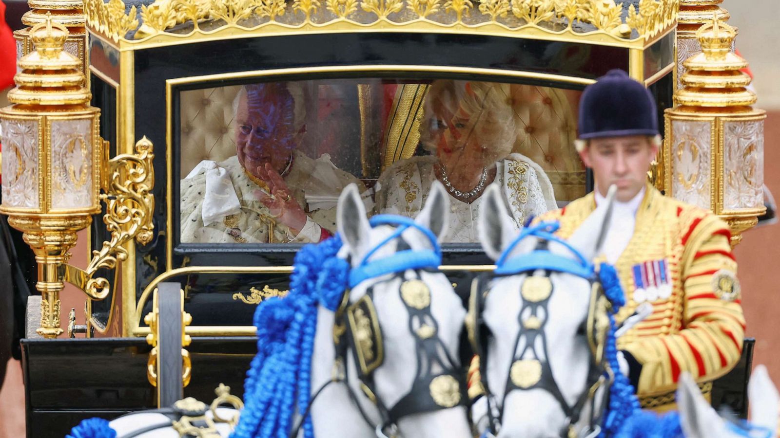 PHOTO: Britain's King Charles and Queen Camilla sit in Diamond Jubilee State Coach at Buckingham Palace on the day of coronation ceremony, in London, May 6, 2023.