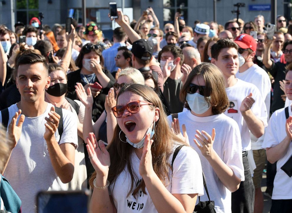 PHOTO: People react after the announcement of the verdict in the embezzlement trial against Russian theatre and film director Kirill Serebrennikov outside a court building in Moscow on June 26, 2020.