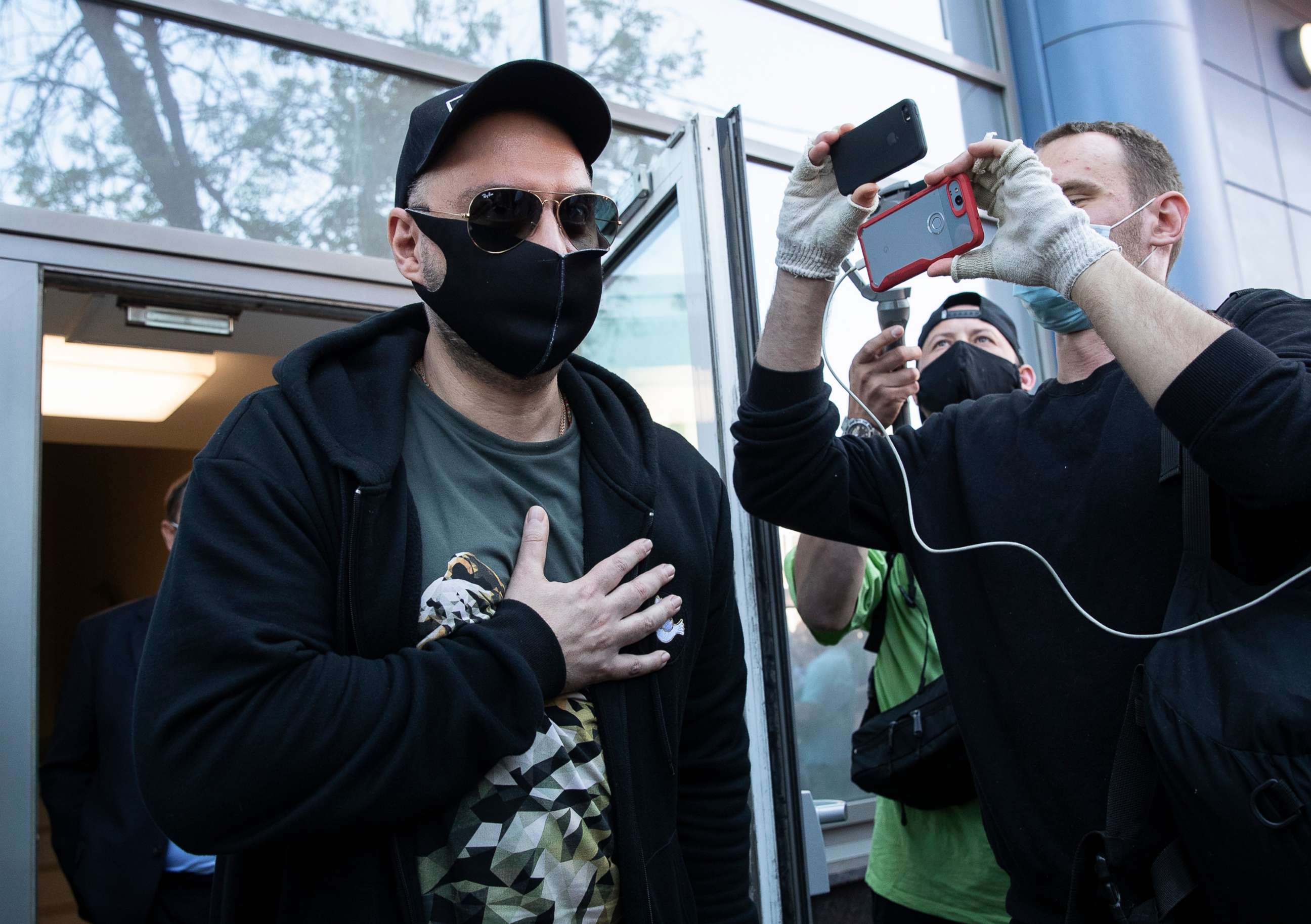 PHOTO: Russian film and theater director Kirill Serebrennikov, wearing a face mask to protect against coronavirus, leaves the Meshchansky court after hearings in Moscow, June 26, 2020.