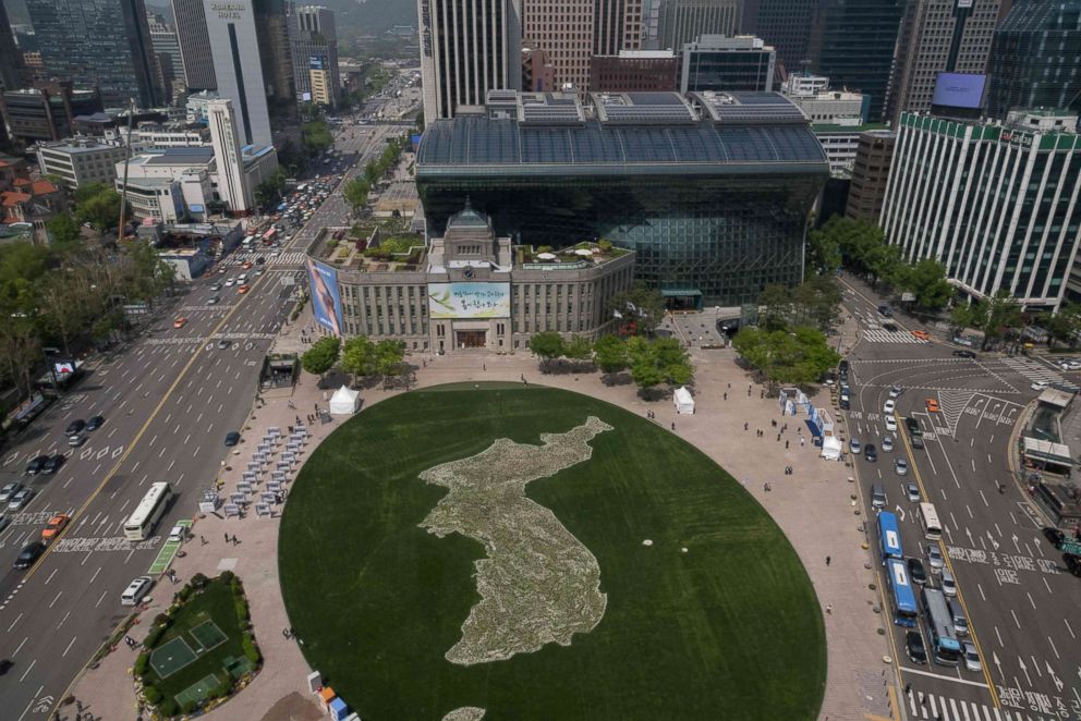 PHOTO: A general view shows a map of the Korean peninsula created using flowers by the Seoul city government to commemorate the upcoming inter-Korean summit, at Seoul city hall plaza, April 26, 2018.