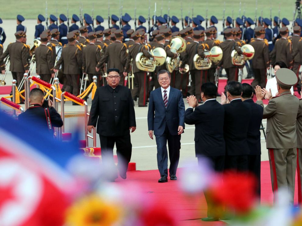 PHOTO: North Korean leader Kim Jong Un welcomes South Korean president Moon Jae-in and at North Korean citizens at Sunan International Airport, Pyongyang North Korea. Sep 18, 2018.