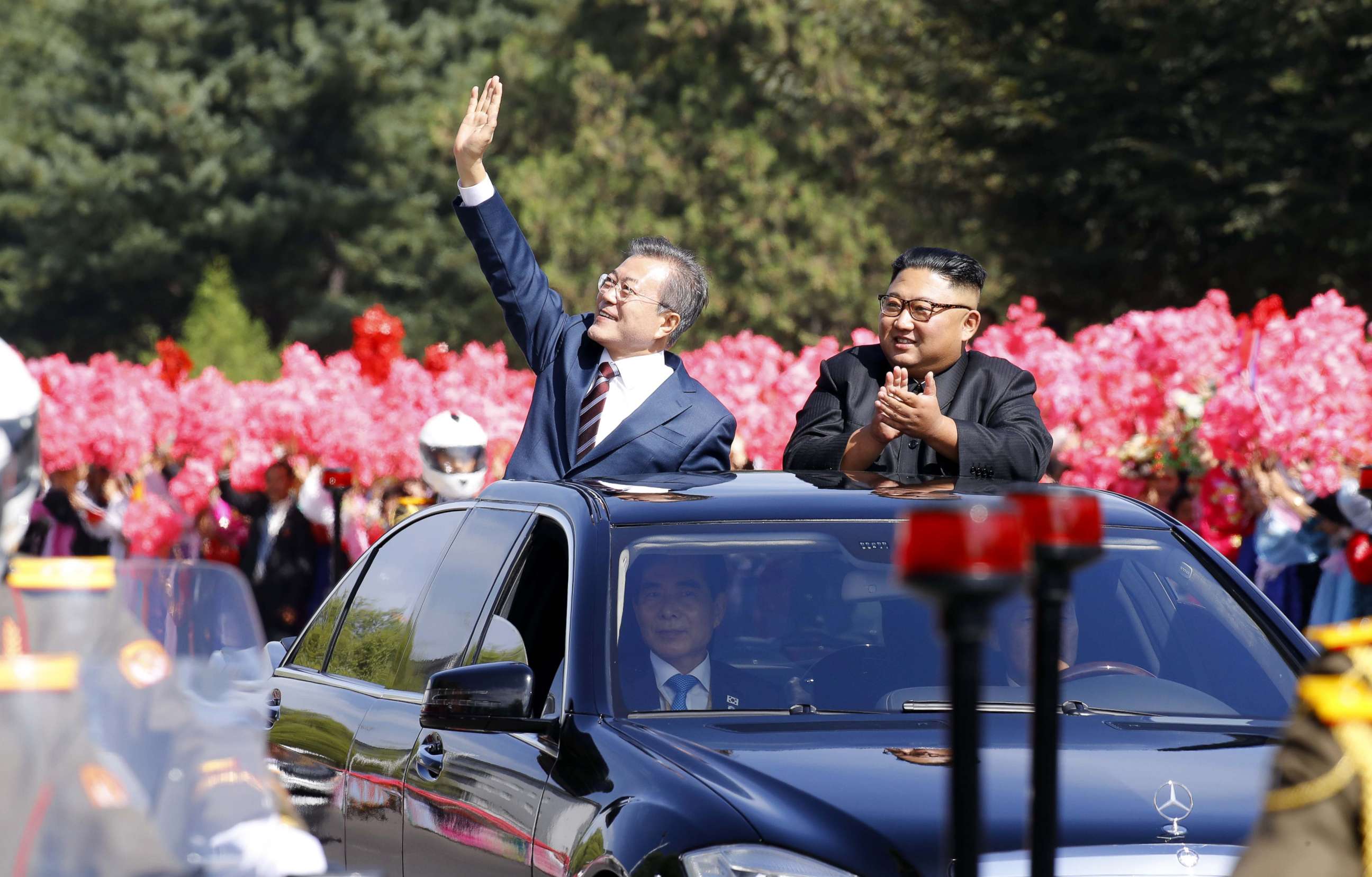 North Korean leader Kim Jong Un and South Korean president Moon Jae-in wave to North Korean citizens at a parade in Pyongyang, North Korea. Sep 18, 2018.