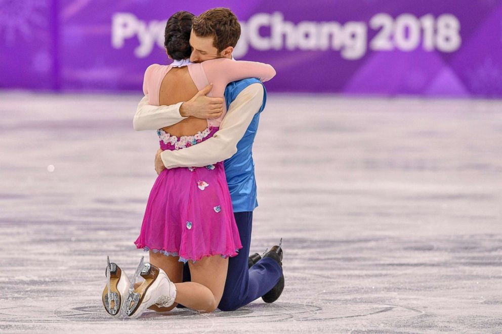 PHOTO: South Korea's Alexander Gamelin and Yura Min hold each other after they finished their routine in the ice dance free dance of the figure skating event, Feb. 20, 2018. 