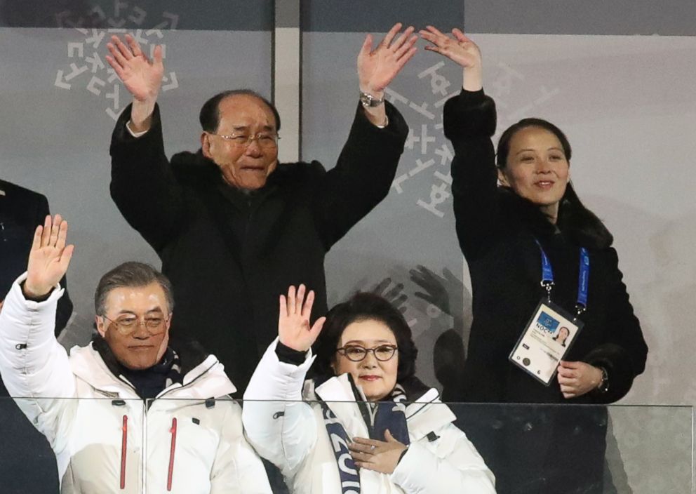 PHOTO: South Korean President Moon Jae-in and first lady Kim Jung-sook, below, along with North Koreans Kim Yong-nam, and Kim Yo-jong, the sister of Kim Jong-un, wave as South and North Korean athletes marched under one flag, Feb. 9, 2018.