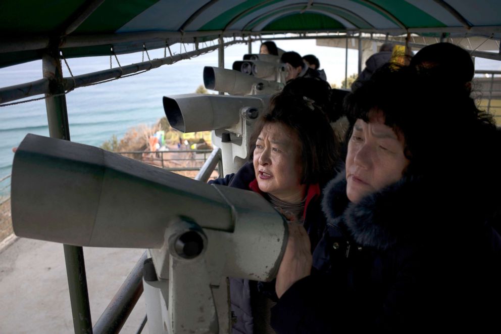 PHOTO:Visitors use binoculars to view North Korea from the Goseong unification observatory in Goseong, South Korea, Feb. 19, 2018. The observatory is one of northernmost points in South Korea where civilians can travel to have a glimpse into North Korea. 